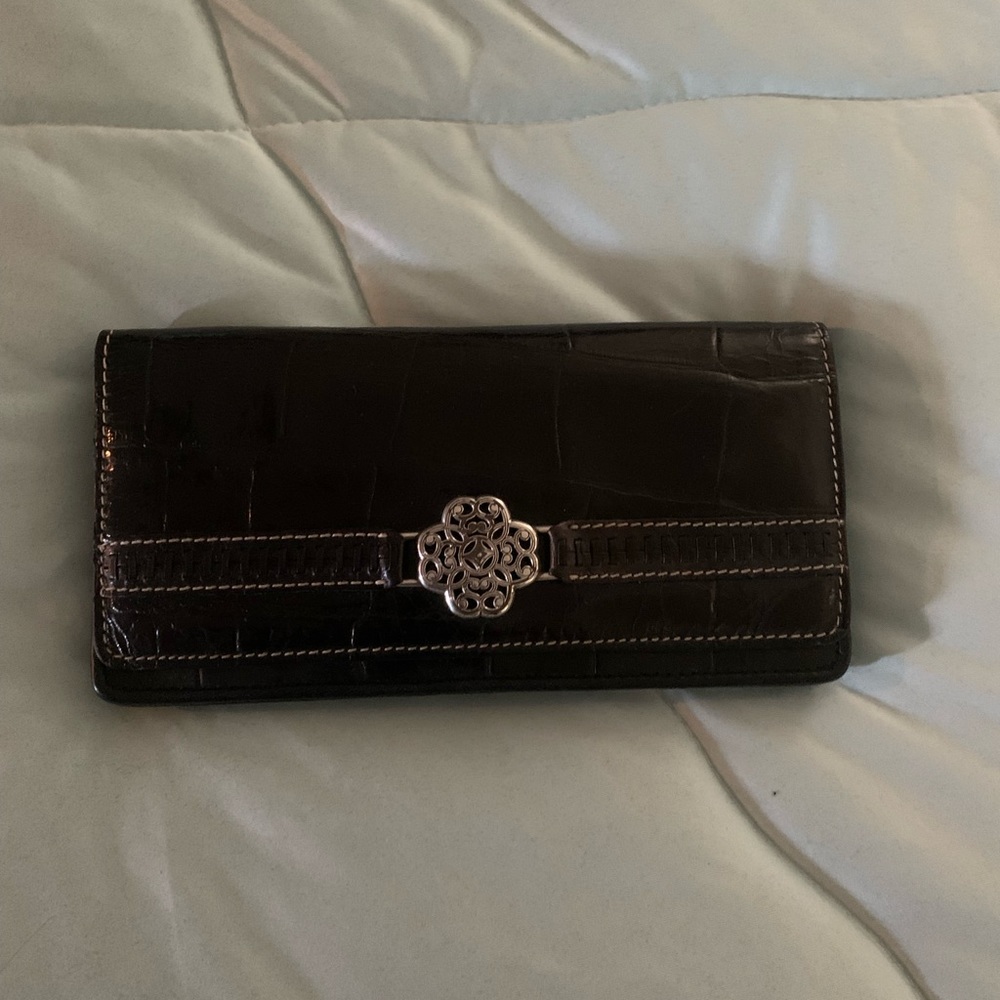 Brighton wallet preowned has wear
